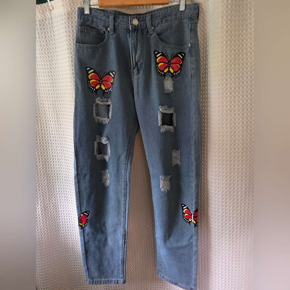 ROMWE Blue Jeans with Butterfly Accents